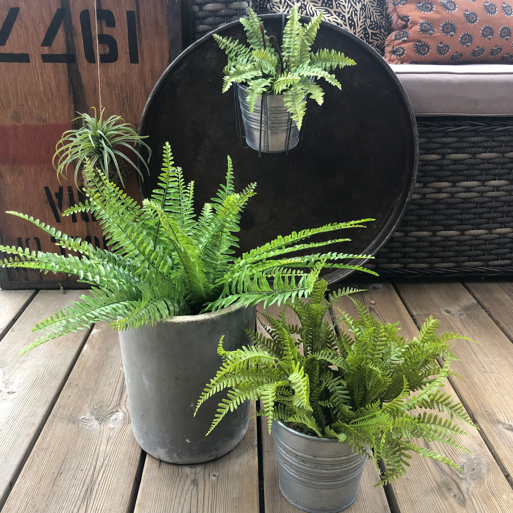 Four easy ways to style faux plants and faux botanicals this summer.